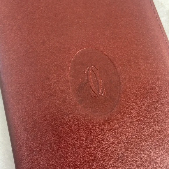 INTERNATIONAL WALLET WITH GUSSETS, MUST DE CARTIER